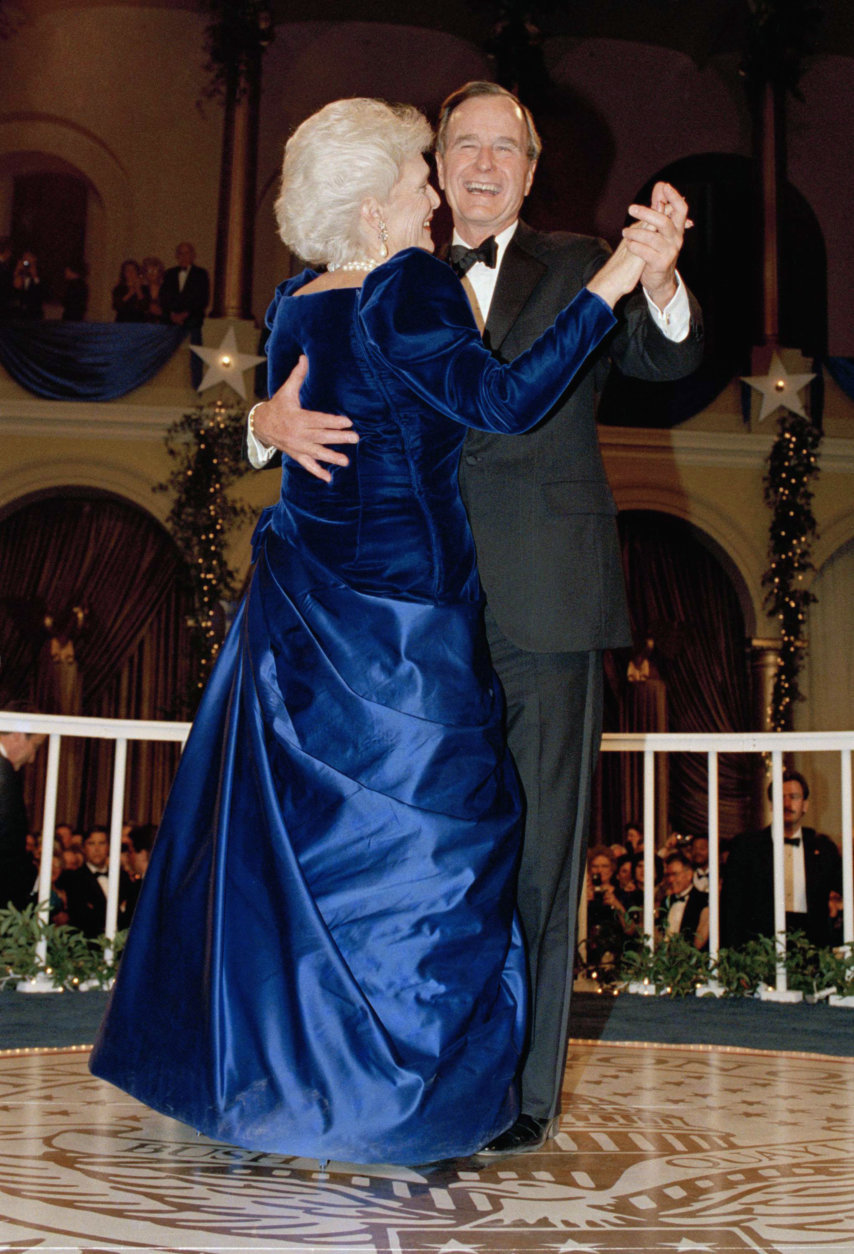 President  George H.W. Bush and wife, Barbara dance at the inaugural ball at the Pension Building in Washington, on Friday, Jan. 20, 1989. (AP Photo/Scott Applewhite)