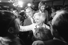 Former CIA director George Bush and his wife, Barbara, smile and shake hands with supporters as Bush left a Concord hotel ballroom after he spoke with supporters in Concord on Tuesday, Feb. 26, 1980. Bush, who was seeking the Republican presidential nomination, received 22 percent of the vote, while rival Ronald Reagan received 52 percent. (AP Photo)