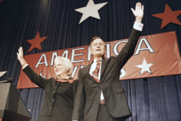 President-elect George H.W. Bush, right, and his wife Barbara Bush, wave to the crowd at a victory celebration rally, Tuesday, Nov. 8, 1988, Houston, Tex. (AP Photo/J. Scott Applewhite)