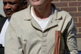 ** FILE ** In this April 28, 2994 file photo, former  CIA agent Aldrich Ames leaves federal court in Alexandria, Va. Ames beat the polygraph test twice and now the Defense Intelligence Agency is nearly tripling its arsenal of lie detectors in an attempt to polygraph every one of its 5,700 prospective and current employees every year. Polygraphy as a screening tool, however, is not fool proof. The test gives a high rate of false positives on innocent people, and guilty testers can be trained to beat the system. (AP Photo/Denis Paquin, File)