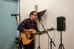 New York-based singer/songwriter Stephen Babcock performs at a D.C. Sofar Sounds concert inside the retail shop Hugh & Crye. (Photo credit Marcelo Perelmuter)
