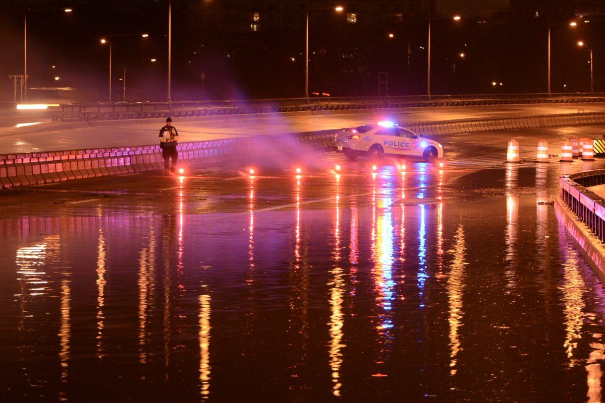 Early Monday morning the I-66 WB  was diverted off Roosevelt Bridge toward US-50 or NB GW Pkwy due to flooding in Arlington. Now getting by without major problems. (WTOP/Dave Dildine)