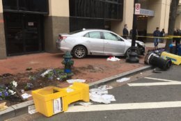 Two cars crashed near the intersection of 9th Street and New York Avenue in Northwest. One of the vehicles ran up onto the sidewalk, colliding with nearby pedestrians. (Courtesy DC Fire and EMS)
