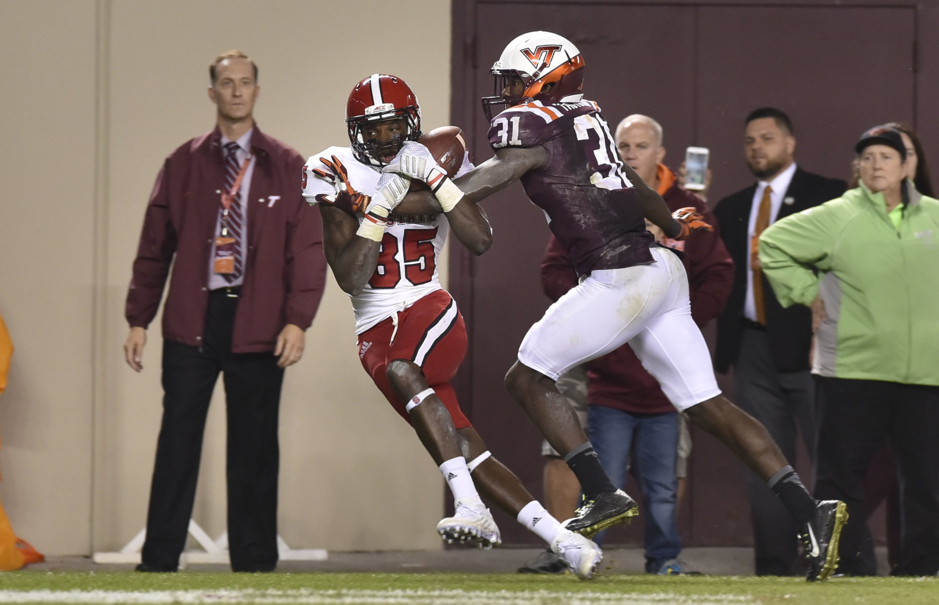 BLACKSBURG, VA - OCTOBER 9: Cornerback Brandon Facyson #31 of the Virginia Tech Hokies deflects a pass intended for wide receiver Jumichael Ramos #85 of the North Carolina State Wolfpack in the second half at Lane Stadium on October 9, 2015 in Blacksburg, Virginia. Virginia Tech defeated North Carolina State 28-13. (Photo by Michael Shroyer/Getty Images)