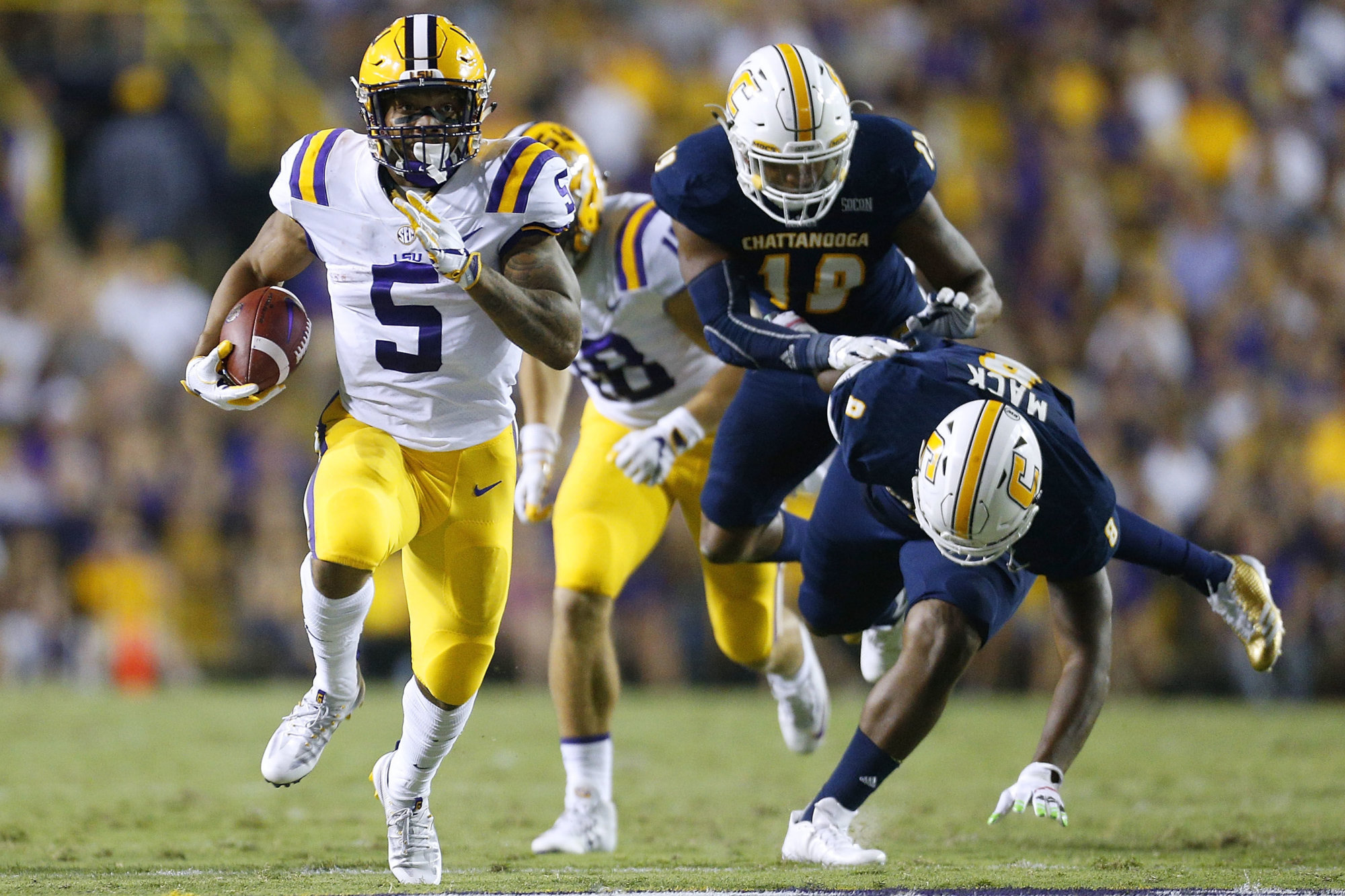 BATON ROUGE, LA - SEPTEMBER 09: Derrius Guice #5 of the LSU Tigers runs with the ball during the first half of a game against the Chattanooga Mocs at Tiger Stadium on September 9, 2017 in Baton Rouge, Louisiana.  (Photo by Jonathan Bachman/Getty Images)