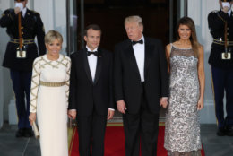 WASHINGTON, DC - APRIL 24: U.S President Donald Trump and U.S. first lady Melania Trump stand with French President Emmanuel Macron and French first lady Brigitte Macron after their arrival at the North Portico before a State Dinner at the White House, April 24, 2018 in Washington, DC. Trump is hosting Macron for a two-day official visit that included dinner at George Washington's Mount Vernon, a tree planting on the White House South Lawn and a joint news conference.  (Photo by Mark Wilson/Getty Images)