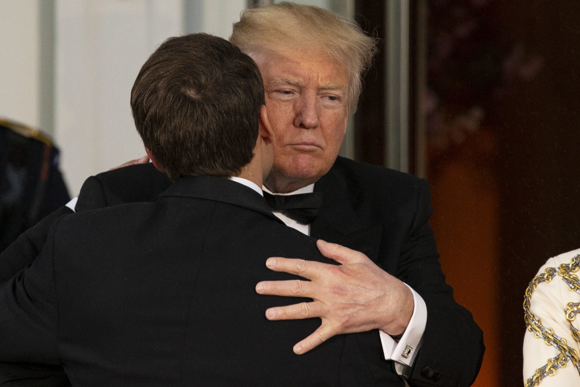 WASHINGTON, DC - APRIL 24: U.S President Donald Trump greets French President Emmanuel Macron after his arrival at the North Portico before a State Dinner at the White House, April 24, 2018 in Washington, DC. Trump is hosting Macron for a two-day official visit that included dinner at George Washington's Mount Vernon, a tree planting on the White House South Lawn and a joint news conference. (Photo by Alex Edelman-Pool/Getty Images)