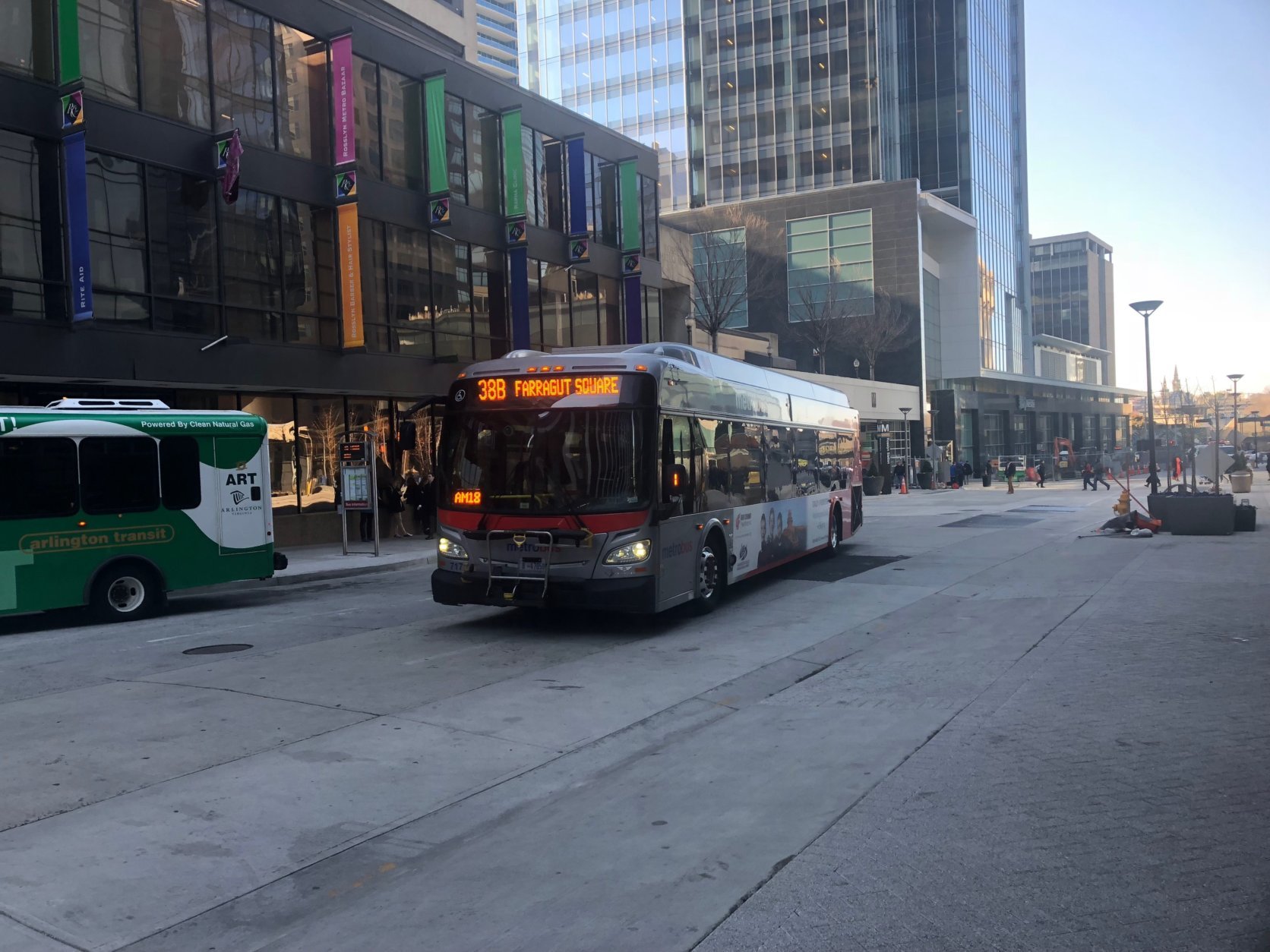 Metrobuses like the 38B have had to loop around onto Wilson Boulevard and other roads, adding to traffic delays and operational costs ever since construction ramped up several years ago. (WTOP/Max Smith)