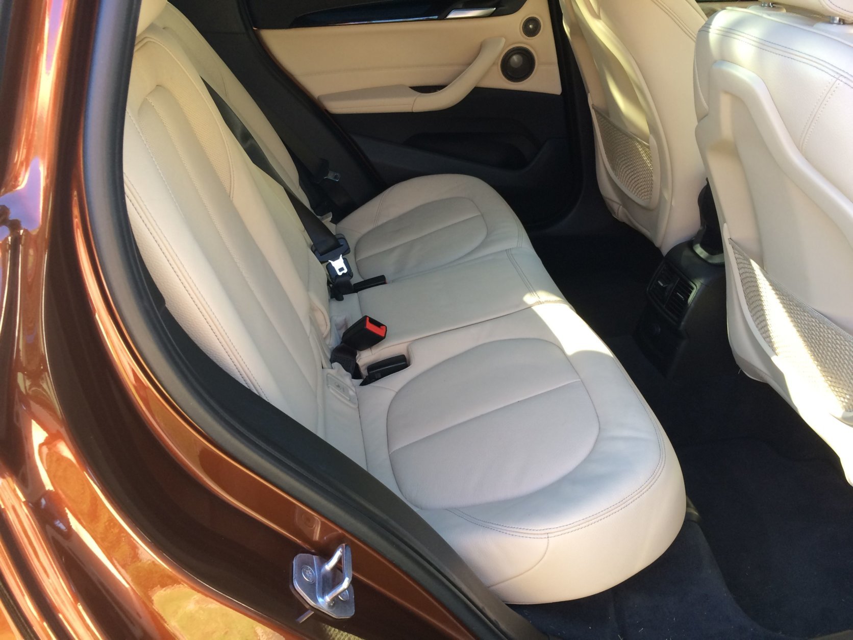 Space is where the redesigned X1 shines. While the original model was tight, the new one is open and airy inside. Rear seat head and leg room is useable for adults. (WTOP/Mike Parris)