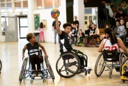 Kidus Ali (center) is the point guard for the Fairfax Falcons wheelchair basketball team, headed to nationals next week. (Courtesy: Joan Wheeler Photography)