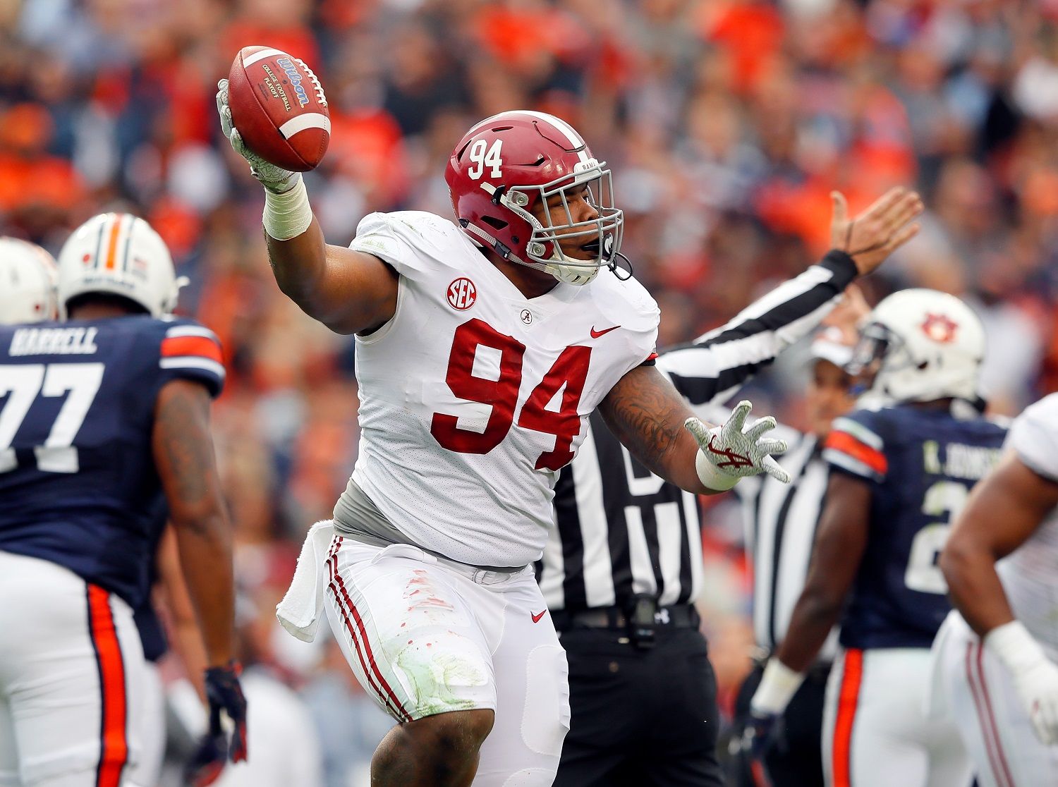 AUBURN, AL - NOVEMBER 25:  Da'Ron Payne #94 of the Alabama Crimson Tide reacts after recovering a fumble during the first quarter against the Auburn Tigers at Jordan Hare Stadium on November 25, 2017 in Auburn, Alabama.  (Photo by Kevin C. Cox/Getty Images)