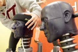Sensors embedded in the dummy's heads measured linear and rotational acceleration for the calculation of a STAR rating, which represents how much the equipment reduced a player’s risk of concussion for a given impact. (Courtesy Virginia Tech)