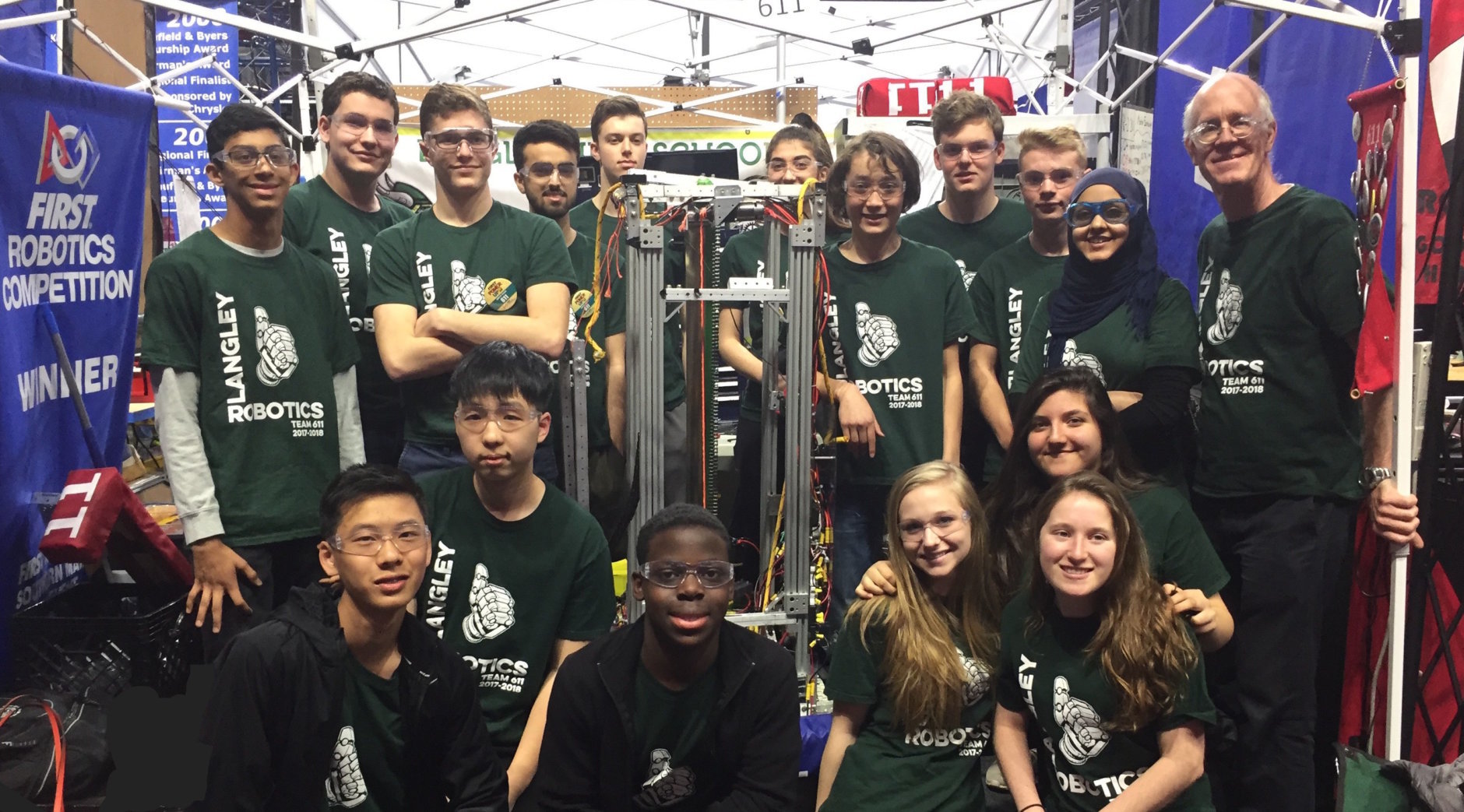 The Langley High School robotics team, pictured at the District Championship at the University of Maryland, will be going to the world championships in Detroit next week. (Courtesy of Amy and Derrick Swaak)