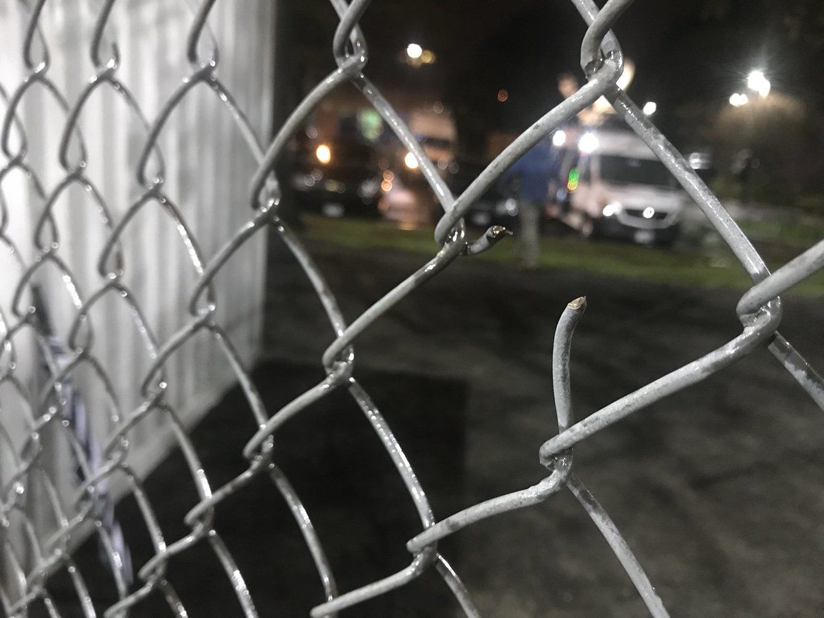 Evidence of 2017's Congressional Baseball shooting is still evident in the fence near the third base dugout at Simpson Stadium in Alexandria on April 25, 2018. (WTOP/Neal Augenstein)