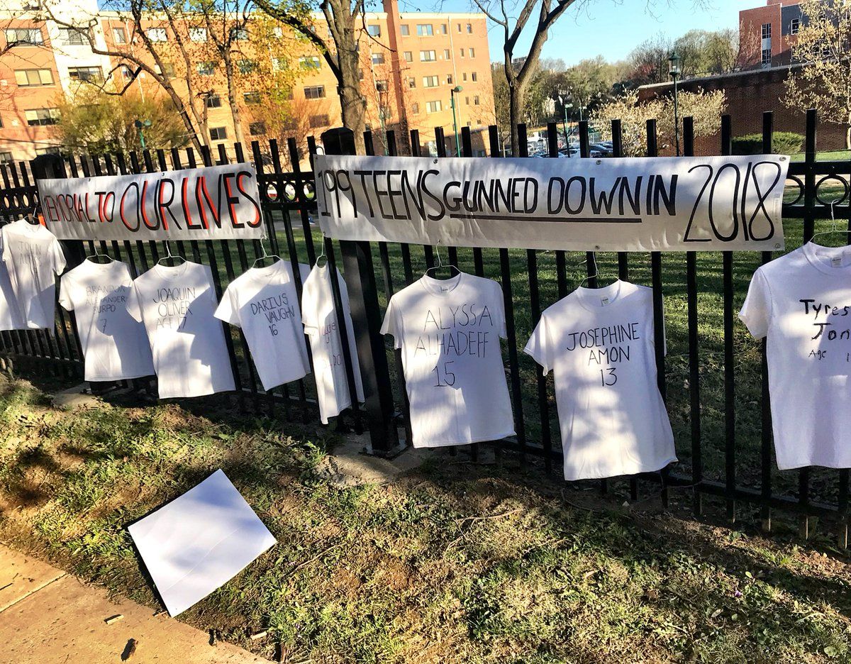 Students at Bethesda-Chevy Chase High School display 199 T-shirts to represent the teens killed by guns in 2018. (WTOP/Neal Augenstein) 