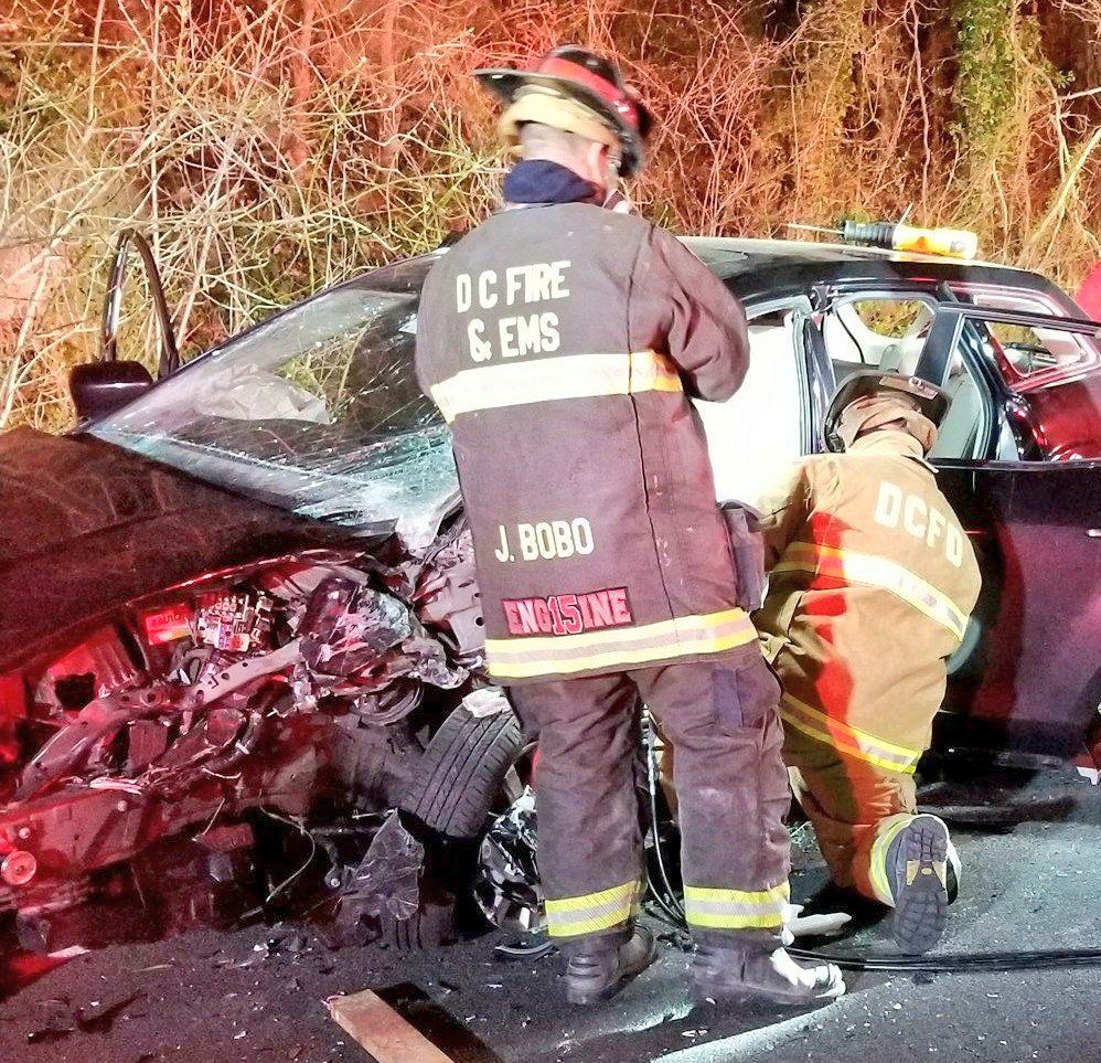 D.C. Fire and EMS are shown extricating victims from the crash on Clara Barton Parkway Sunday morning. (Courtesy D.C. Fire and EMS)