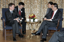 U.S. Treasury Secretary Tim Geithner, left, meets with China's Vice Premier Wang Qishan for a bilateral meeting following the G-20 Leaders Summit, in London, Thursday, April 2, 2009. U.S. President Barack Obama and China's President Hu Jintao have announced that Secretary Geithner and Vice Premier Wang will lead the economic track of the U.S.-China Strategic and Economic Dialogue for the their respective countries. (AP Photo/Akira Suemori)