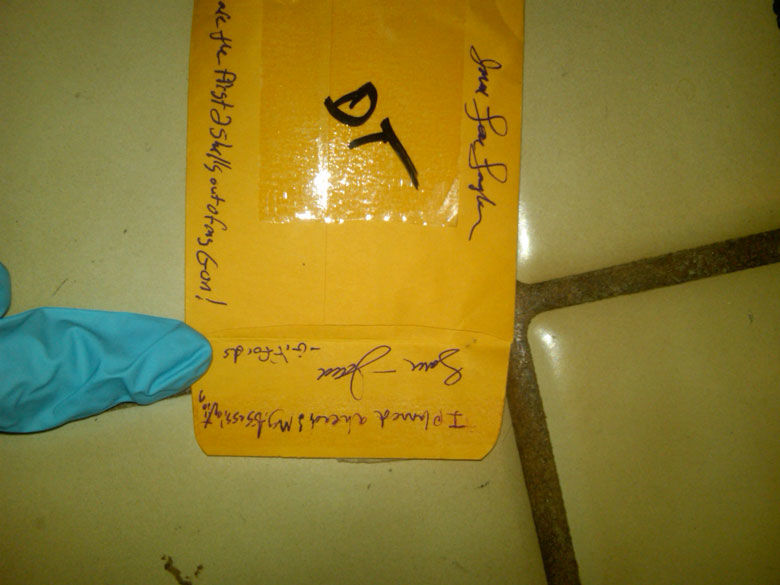 Yellow envelope with writings in black marker from shooter Jared Lee Loughner. (Courtesy photo FBI)