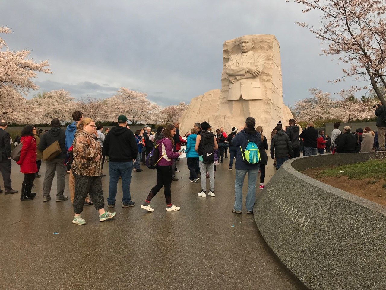 Visitors to the MLK, Jr. Memorial are discussing King's eloquence and ability to mobilize people of many backgrounds. (WTOP/Neal Augenstein)