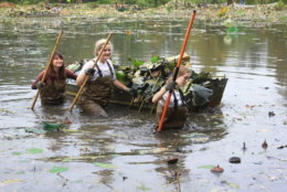Young women help clean up Kenilworth Aquatic Gardens during 2016's National Public Lands Day.