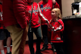 Keelan Moxley and her parents meet with Ted and Lynn Leonsis. (Courtesy Monumental Sports & Entertainment)
