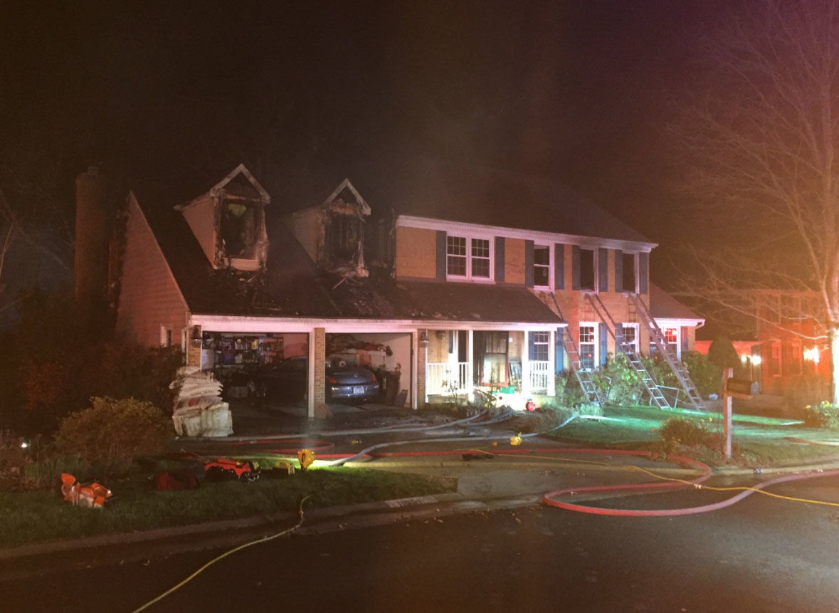 Fire breaks out in a Reston house Saturday, April 14, 2018.  (Courtesy Fairfax County Fire and Rescue)