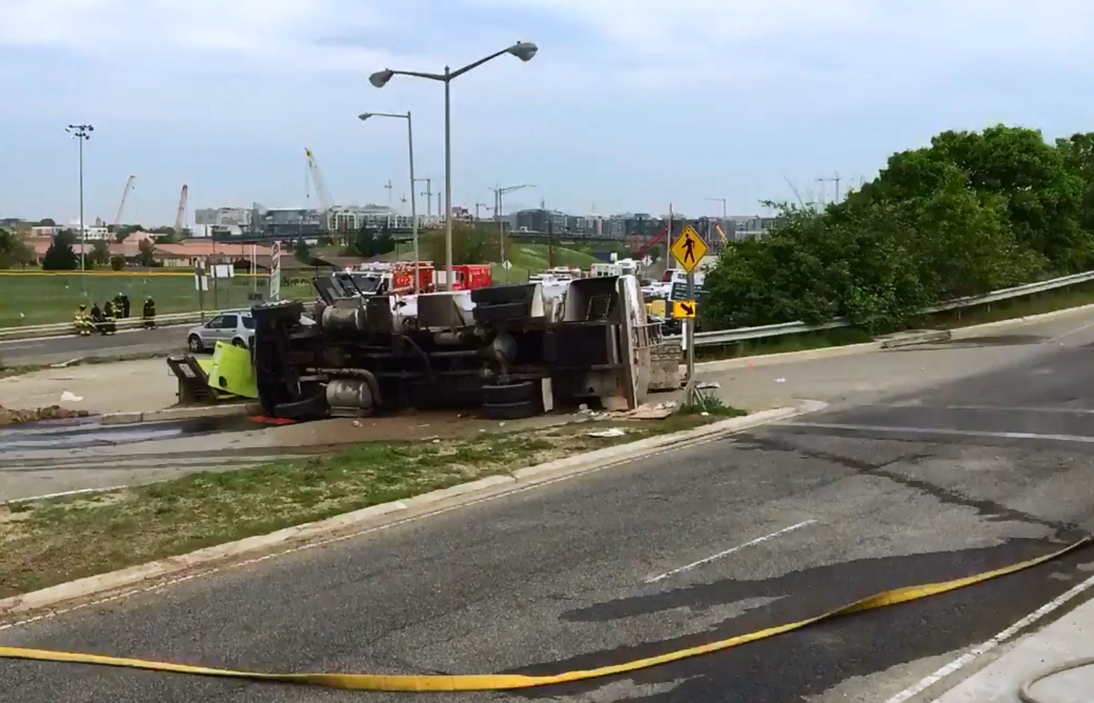 The truck overturned in the 2300 block of South Capitol Street south of the Douglass Bridge at about 7 a.m. Friday. (Courtesy D.C. Fire and EMS)