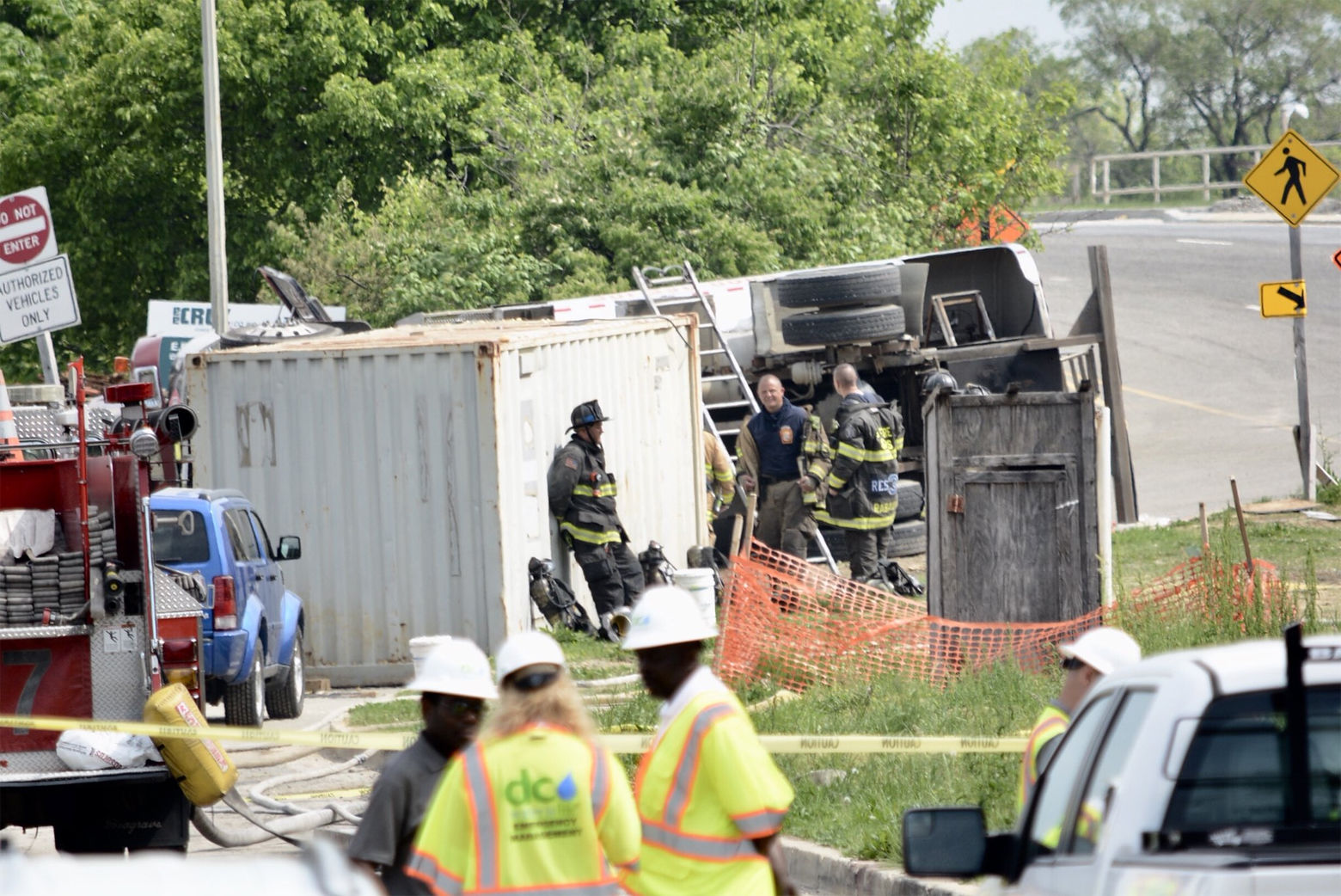 The overturned tanker on South Capitol Street near the Suitland Parkway was carrying about 1,700 gallons of diesel when it overturned. About 500 gallons spilled, fire officials said. (WTOP/Dave Dildine)