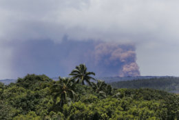 Kilauea volcano erupts, Friday, May 4, 2018, in Kalapana, HI.  There are no immediate reports of major damage after a large earthquake struck Hawaii's Big Island near a volcanic eruption that has forced residents to evacuate from their homes. Hawaii National Guard spokesman Maj. Jeff Hickman says the Hilo airport and the highways didn't sustain any damage from Friday's magnitude-6.9 quake. (AP Photo/Marco Garcia)