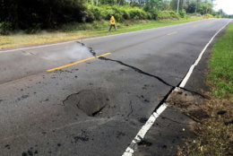 PAHOA, HI - MAY 5: In this handout photo provided by the U.S. Geological Survey, a crack opened on Pohoiki Road just east of Leilani Street after the eruption of Hawaii's Kilauea volcano on May 5, 2018 in the Leilani Estates subdivision near Pahoa, Hawaii. The governor of Hawaii has declared a local state of emergency near the Mount Kilauea volcano after it erupted following a 5.0-magnitude earthquake, forcing the evacuation of nearly 1,700 residents. (Photo by U.S. Geological Survey via Getty Images)