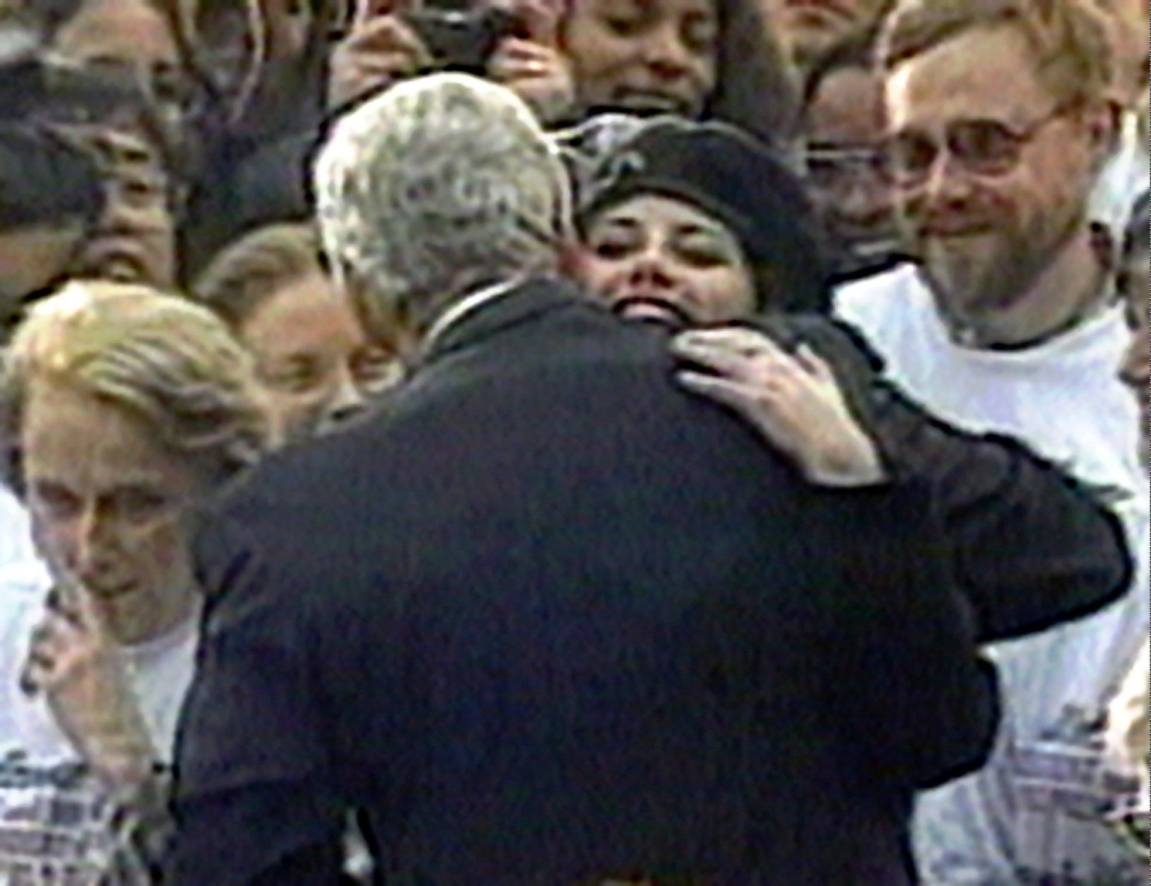 FILE - In this Nov. 6, 1996 file image taken from video, Monica Lewinsky embraces President Clinton as he greeted well-wishers at a White House lawn party in Washington Nov. 6, 1996. The long-running drama of Hillary Clinton's marriage _ her husband's infidelity and how she dealt with it _ is back as a subtext in this year's presidential race.   (AP Photo/APTV)
