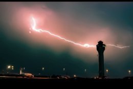 Lightning streaks across the sky at Dulles Airport. (Courtesy BDwy via Twitter)