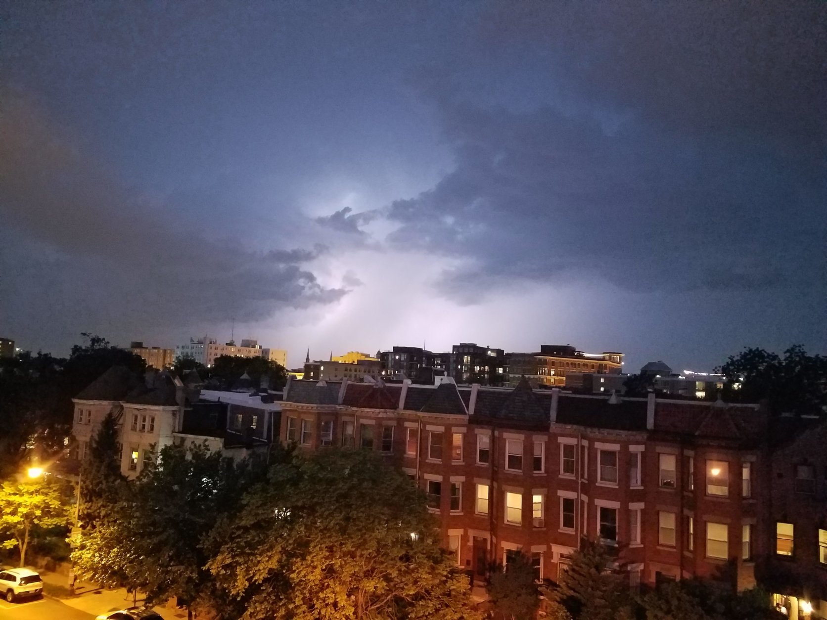 Lightning breaks over Columbia Heights in the District. (WTOP/Will Vitka)