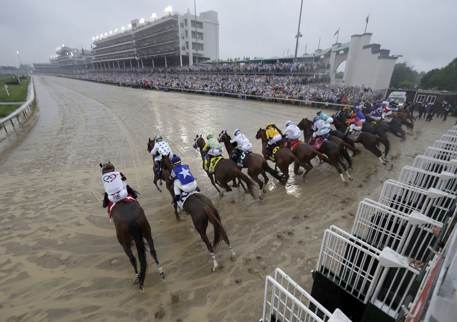 Horses leave the starting gate during the 144th running of the Kentucky Derby horse race at Churchill Downs Saturday, May 5, 2018, in Louisville, Ky. (AP Photo/John Minchillo)