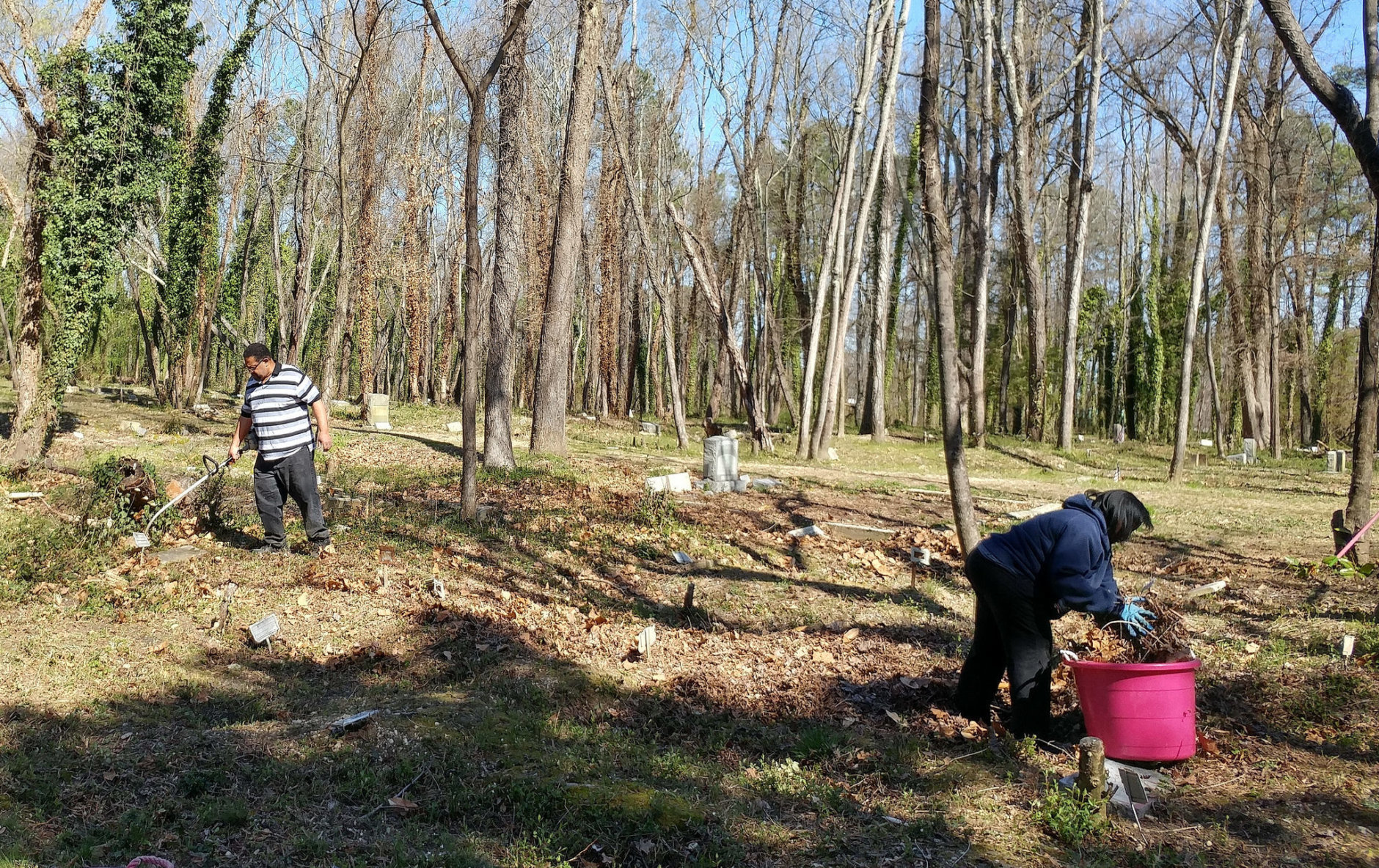 Families work to preserve the grave sites of their ancestors at East End Cemetery. (Photo credit: George Copeland Jr.)
