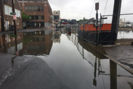 What one Alexandria resident called fairly standard tidal floooding in Old Town Thursday, May 17, 2018. (WTOP/Kristi King)