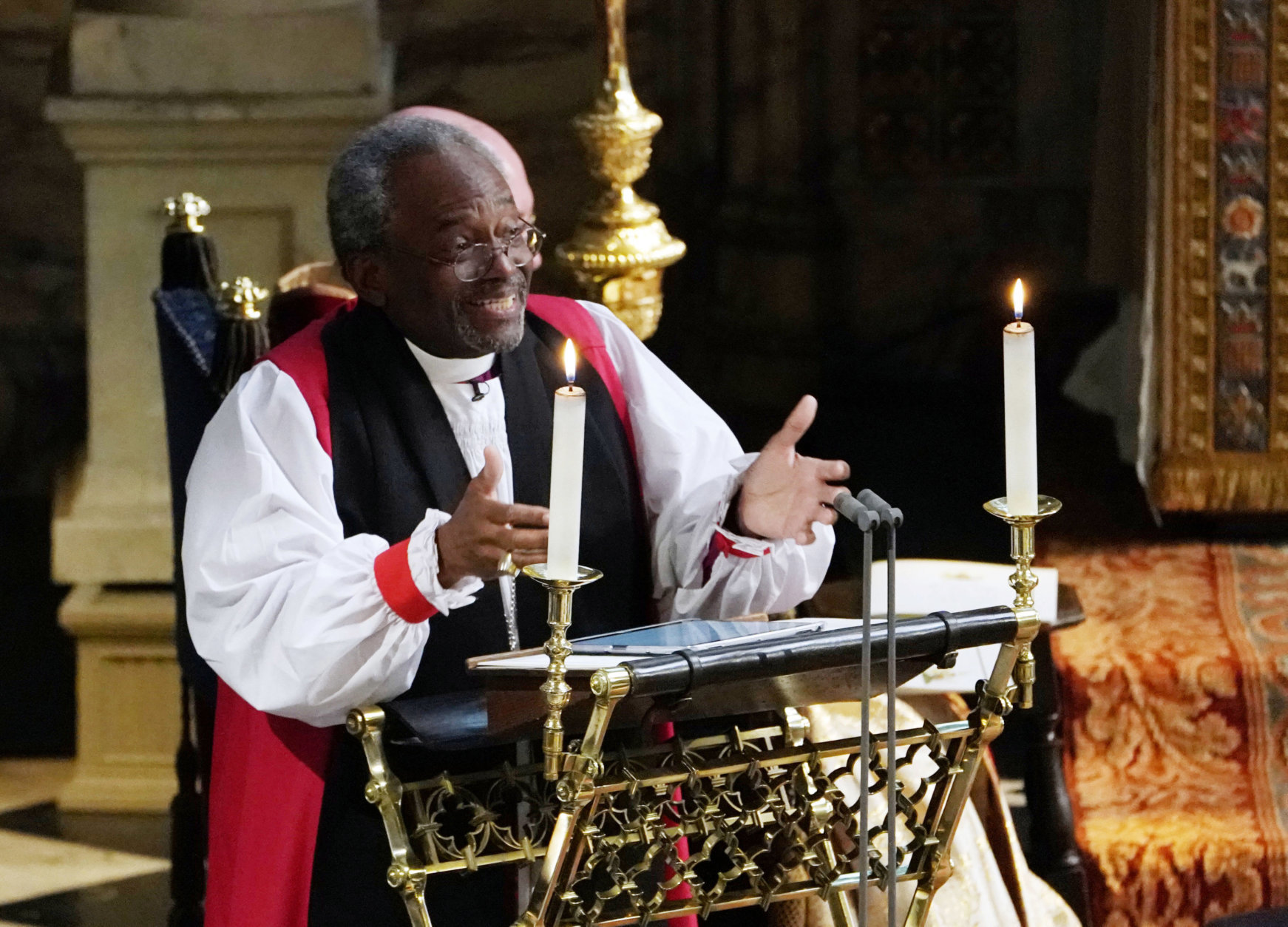 The Most Rev Bishop Michael Curry, primate of the Episcopal Church, speaks during the wedding ceremony of Prince Harry and Meghan Markle at St. George's Chapel in Windsor Castle in Windsor, near London, England, Saturday, May 19, 2018. (Owen Humphreys/pool photo via AP)