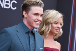 Jesse McCartney, left, and Katie Peterson arrive at the Billboard Music Awards at the MGM Grand Garden Arena on Sunday, May 20, 2018, in Las Vegas. (Photo by Jordan Strauss/Invision/AP)