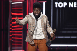 Khalid accepts the award for top new artist at the Billboard Music Awards at the MGM Grand Garden Arena on Sunday, May 20, 2018, in Las Vegas. (Photo by Chris Pizzello/Invision/AP)
