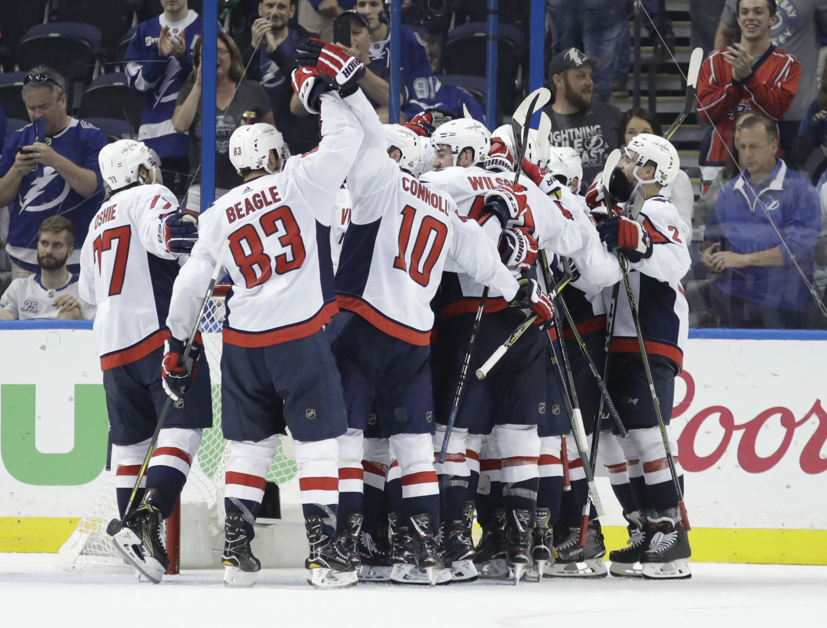 Washington Capitals celebrate after defeating the Tampa Bay Lightning 4-0 in Game 7 of the NHL Eastern Conference finals hockey playoff series Wednesday, May 23, 2018, in Tampa, Fla. (AP Photo/Chris O'Meara)