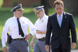 From left, Baltimore County Police Chief Jim Johnson, Baltimore County Police Col. Peter Evans and Baltimore County Executive Kevin Kamenetz arrive for a news conference outside WMAR-TV Tuesday, May 13, 2014, in Towson, Md. The officials announced that a man was taken into custody after allegedly crashing a vehicle into the television station. (AP Photo/Steve Ruark)