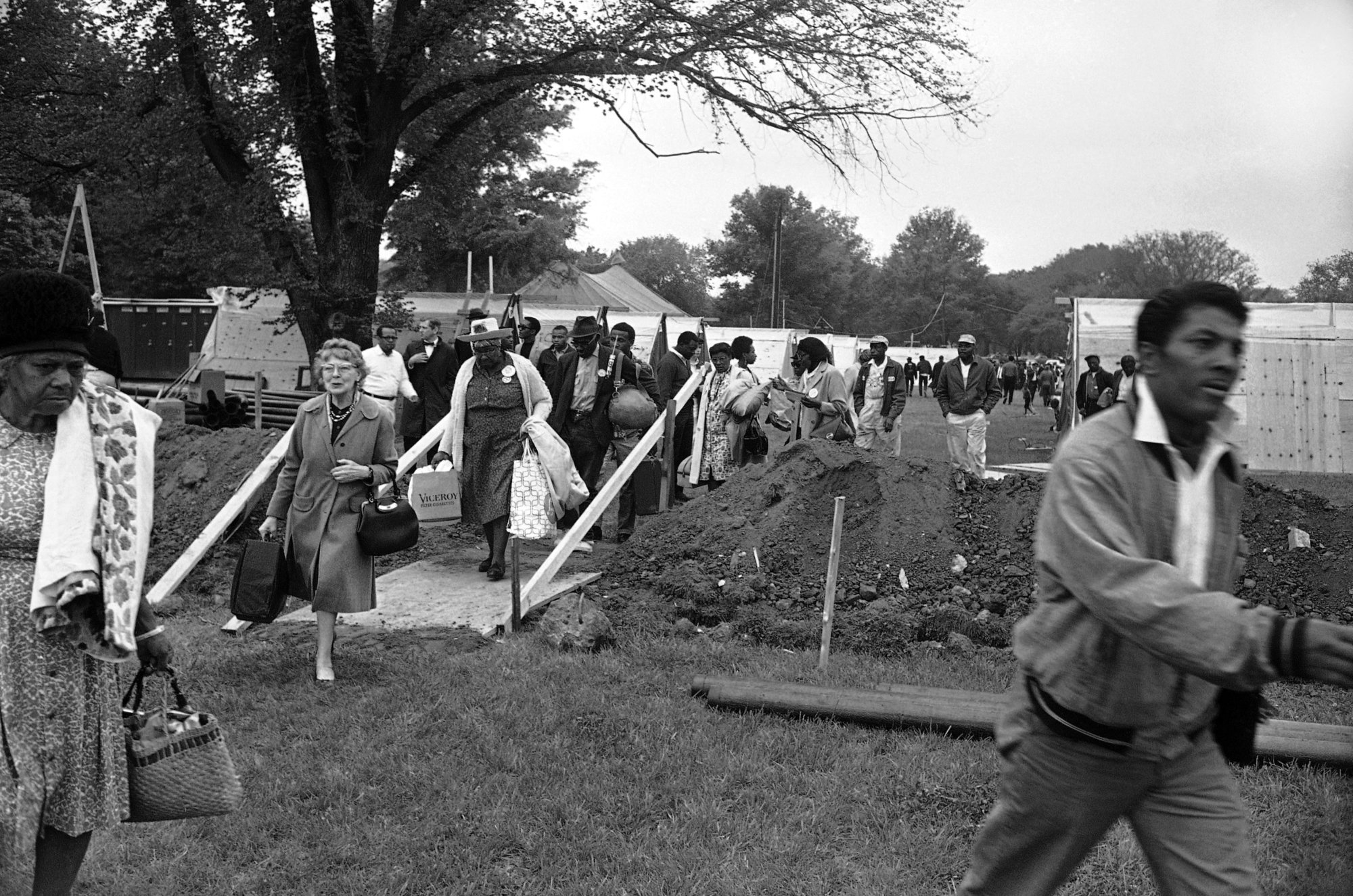 Workmen set up flooring and A-frames for the wooden camp near Lincoln Memorial to house the Poor Peoples Campaign demonstrators in Washington, May 13, 1968. A federal permit allows the demonstrators to occupy the 15-acre area until on June 16 and limits occupants to 3,000. (AP Photo/Bob Schutz)