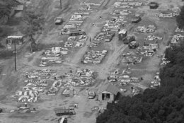 Resurrection City, the campsite of the Poor People's Campaign, is being rapidly dismantled on June 25, 1968 and removed from public land it occupies in Washington, D.C.   This is a view of the scene from the top of the Washington Monument,  June 25, 1968.   Only the floors of its many plywood shanties and some personal belongings of its former occupants remain. (AP Photo/Bob Daughtery
