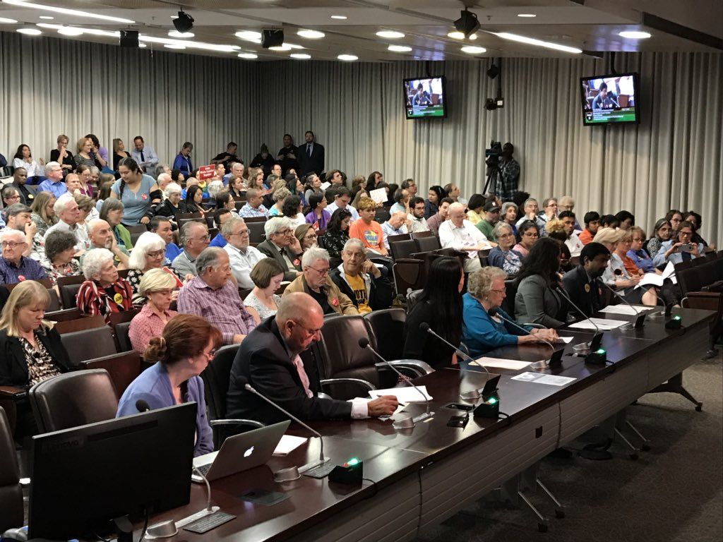 The seats were packed Tuesday night with Montgomery County residents attending a public hearing on a plan to set aside $373,000 in legal aid money for low income Montgomery 
County immigrants who are facing deportation. (WTOP/Michelle Basch) 