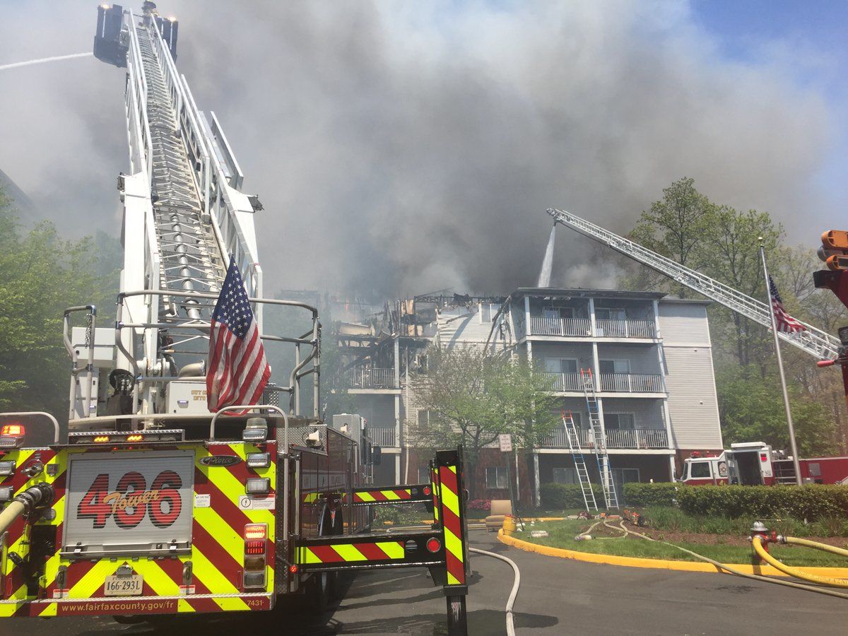 Crews fight flames at the Forest Glen Senior Apartments in the 14400 block of Woodmere Court in Centreville Wednesday afternoon. (Courtesy Fairfax County Fire and Rescue)