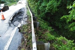 In Prince George's County, Livingston Road near Clarion Road in Ft. Washington closed Wednesday due to the pavement caving in following heavy rains. (Courtesy Prince George's County DPWT) 