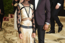 NEW YORK, NY - MAY 07:  Letitia Wright and John Boyega attend the Heavenly Bodies: Fashion &amp; The Catholic Imagination Costume Institute Gala at The Metropolitan Museum of Art on May 7, 2018 in New York City.  (Photo by Jamie McCarthy/Getty Images)