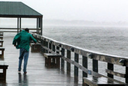 MELBURNE BEACH, FL - SEPTEMBER 4:  Rick Thomas down a pier on the the Indian River to watch the storm September 4, 2004 in Melbourne Beach, Florida. Hurricane Frances is a slow moving category 2 hurricane that is expected to affect Florida for days.  (Photo by Gerardo Mora/Getty Images)