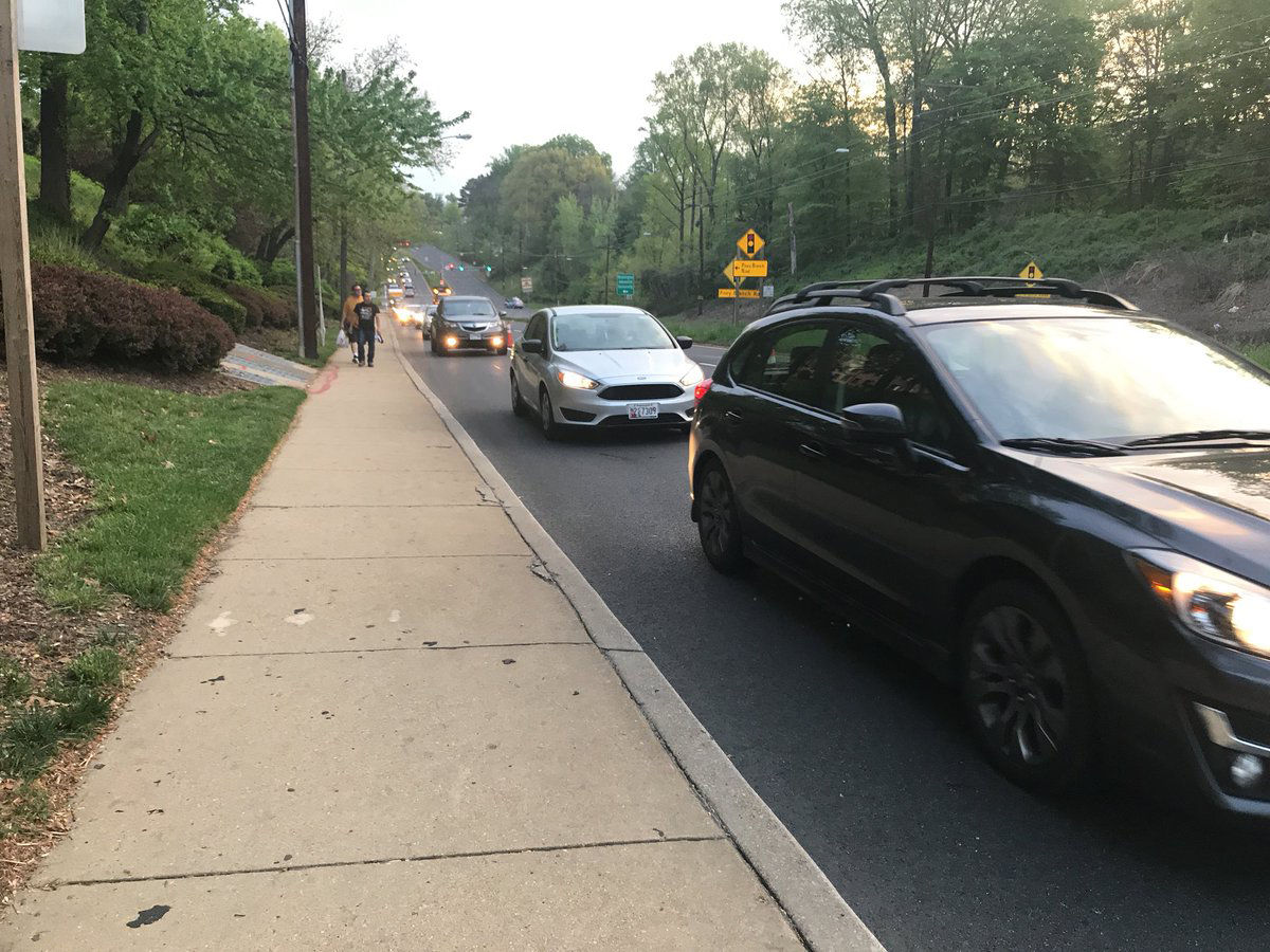 One lane of southbound New Hampshire Avenue in Langely Park, Maryland, reopened a little before 6:30 a.m. Traffic had been closed in both directions for several hours and officials said it might be a few hours more before the road completely reopens. (WTOP/Neal Augenstein)