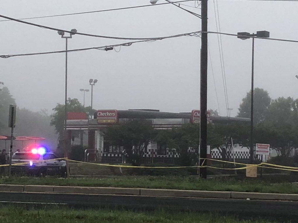 Prince George's County police investigate an officer involved shooting at a Checkers on Woodyard Road near Branch Avenue in Clinfton, Maryland. (WTOP/Melissa Howell)
